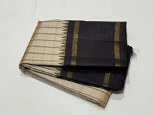 Khakhi Beige with Kanchana Black Handwoven Pure Jari Korvai Checked Kanchipuram Silk Saree with Rettapet borders Seer Pallu and contrast woven blouse beauty