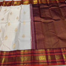 Vaibhogam-Mesmerizing Offwhite with Deep Maroonish Brown Handwoven Pure Jari Korvai Kanjivaram Silk with beautiful buttas gorgeous varisaipet borders rich pallu and contrast woven blouse
