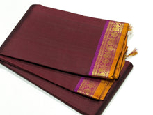 Nayaki- Deep Maroonish Brown  with Magenta and Purple Short  combo in a beautiful Handwoven Small Borders Pure Jari Kanjivaram Silk Saree with paisleys and peacocks woven borders rich seer pallu and contrast woven blouse