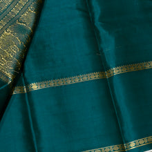 Sahana- Mesmerizing Deep Teal with Gold Handwoven Pure Jari Kanjivaram Silk with beautiful Neliveldhari Woven body with yazhis and gandaberundas woven beautiful doublepet borders with rich and self colored blouse