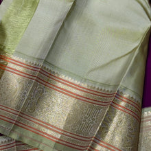 Vaibhogam -Deep Purple with Elakka Green in Kai Korvai Buttas Kanjivaram Silk Saree with beautiful diamonds and rudrakshas woven body intricate thambalam motifs woven borders rich pallu and contrast woven blouse