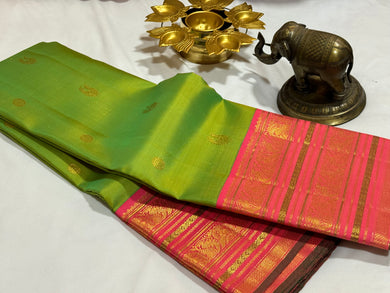 Vintage Weave Parrot Green with Coral Pink Korvai with Buttas and Varisaipet Borders In a Handwoven Pure Jari Korvai Kanjivaram Silk Saree Beauty