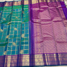Vaibhogam-Gorgeous Peacock Green with Purple Handwoven Pure Jari Kanjivaram Silk with beautiful Jari checks with elephants and annapakshis woven body with rich borders pallu and contrast jari checked blouse