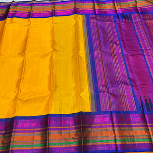 Yellow with Royal Blue and Pink Handwoven Pure Zariless Korvai Kanjivaram Silk Saree Beauty with Varisaipet Borders