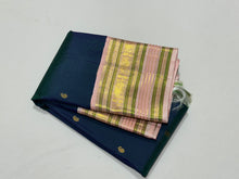 Deep Prussian Blue (dual tone of sapphire blue and green) with Soft Pink Buttas Handwoven Pure Jari Korvai Kanjivaram Silk Saree with rich meenakari varisaipet borders with vel, annam, manga, Neli streaks woven rich borders rich pallu and contrast woven