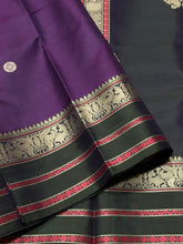 Saraswati- Gorgeous Purple with Dark Blackish Green Handwoven Pure Zariless Kanjivaram Silk with beautiful chakram and deer motifs woven all over the body with beautiful butterflies and deers woven borders l sorgavaasal pallu and contrast woven blouse