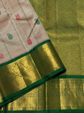 Vaibhogam-Gorgeous Beige Abirami with Ganga Jamuna borders Striped body with silk thread buttas with rich bottle green rich and beautifully wovwn pallu and contrast woven blouse