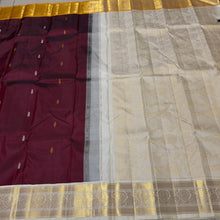 Vaibhogam- Gorgeous Deep Maroon with Mustard and Offwhite Handwoven Pure Jari Korvai Kanjivaram Silk with buttas woven body rich borders dancing women and musical instruments woven pallu and contrast woven blouse