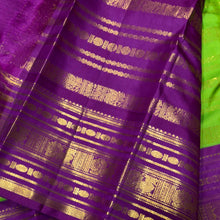 Vaibhogam- Stunning Parrot Green with Purple Handwoven Pure Zari Korvai Kanjivaram Silk with Beautiful Jari Veldhari woven body with rich varisaipet borders gorgeous palli and contrast veldhari stripes woven blouse