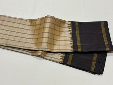 Khakhi Beige with Kanchana Black Handwoven Pure Jari Korvai Checked Kanchipuram Silk Saree with Rettapet borders Seer Pallu and contrast woven blouse beauty