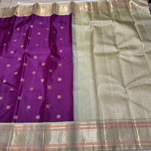 Deep Purple with Elakka Green in Kai Korvai Buttas Kanjivaram Silk Saree with beautiful diamonds and rudrakshas woven body intricate thambalam motifs woven borders rich pallu and contrast woven blouse