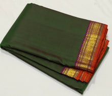 Nayaki- Deep Forest Green with Dark magenta Small borders Handwoven Pure Jari Kanjivaram Silk with small borders rich pallu and contrast woven blouse