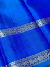 Violetish Blue with Lapis Blue Handwoven Pure Korvai Kanjivaram Silk Saree with Buttas Body Doublepet Borders rich Simhayazhi Pallu and Contrast Blouse