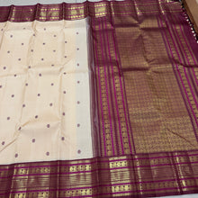 Vaibhogam- Gorgeous Offwhite with Maroonish Brown Handwoven Pure 2g jari Korvai with Buttas Kanjivaram Silk with beautiful thread kamalam buttas woven body with rich varisaipet small elephants and neli veldhari borders rich pallu and contrast woven blouse