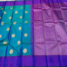 Gorgeous Dual tone Peacock Blue Green with Purple Handwoven pure Jari Kanjivaram Silk Saree with Horse motifs woven body plain beautiful borders rich mayil chakram buttas woven pallu and contrast woven blouse
