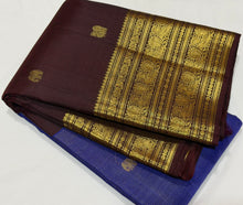Vaibhogam- Gorgeous Ink Blue with Coffee Brown Vairaoosi with Buttas Handwoven Pure 2g Jari Kanjivaram Silk with beautiful small elephants and peacocks woven body and middle borderd and rich coffee brown borders pallu and contrast woven brown blouse