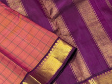 Double tone Orange mixed with deep magenta  Handwoven Pure Jari muthukattam woven Kanjivaram with rich borders pallu and contrast woven blouse beauty
