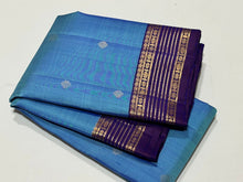 Sahana-Gorgeous Light  Blue with Deep Purplish Blue Buttas Handwoven pure Kanjivaram Silk wirh beautiful  borders rich pallu and contrast woven blouse