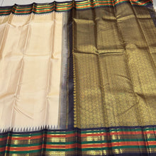 Vaibhogam -Gorgeous Handwoven Pure Jari Vairaoosi Korvai Kanjivaram Silk in tussar white with kanchana black combination with varisaipet beautiful borders with temples woven with rich pallu and contrast Vairaoosi woven beautiful blouse