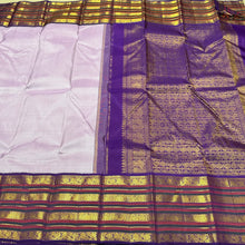 Vaibhogam- mesmerizing Lavendar with Deep Purple Korvai  Handwoven Pure 2gram Jari Kanjivaram Silk with Varisaipet borders woven beautiful body with Purple jamudu with super gorgeous pallu and contrast deep purple blouse. A very intricately woven borders