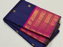 Vaibhogam- Stunning Deep Blue with Fuchsia Pink Handwoven Pure Jari Korvai Kanjivaram Silk with beautiful buttas woven body with rich varisaipet borders beautiful pallu and contrast woven blouse with green selvedges
