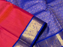 Sarasangi- Stunning Dual Tone Tomato Pink with Royal Blue Handwoven Pure Jari Korvai Kanjivaram Silk with beautifully woven borders rich pallu and contrast blue blouse