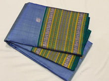 Saraswati- Powder Blue with Peacock Blue Handwoven Pure Zariless Premium Kanchipuram Silk with beautiful varisaipet borders rich pallu and contrast peacock blue blouse