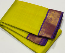 Sarasangi -Beautiful Lime Green with Purple Handwoven Pure Jari Korvai Kanjivaram Silk with small borders with elephants yazhis and peacocks woven borders rich pallu and contrast woven beautiful blouse