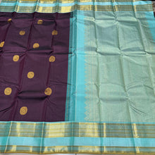 Vaibhogam-Gorgeous Deep Beetlenut Brown with Dual tone aqua greenish blue Handwoven Pure Jari Korvai Kanjivaram Silk with rich buttas doublepet borders beautifully woven pallu and contrast woven blouse