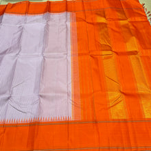 Sarasangi- Gorgeous Lavendar with Orange Handwoven Pure Jari Korvai Kanjivaram Silk with Kasakasa Podikattam woven body with temples woven borders rich jari woven seer pallu and contrast woven blouse