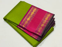 Vaibhogam -Gorgeous Parrot Green with Pink Vairaoosi Handwoven Pure Korvai Kanjivaram Silk with doublepet borders in pink and orange shades with rich pallu and contrast Vairaoosi woven beautiful blouse