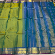 Nayaki- Gorgeous Parrot Green with Peacock Blue tone  Handwoven Pure Kanjivaram Silk with beautiful bawanchi borders with rich pallu and contrast woven blouse