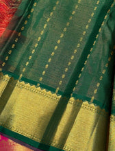 Vaibhogam- Beautiful Dual tone Orange Pink with Green Vairaoosi with Buttas Handwoven Pure Jari Kanjivaram Silk with rich bawanchi borders with green selvedges gorgeous Kalakshetra Kili Pallu and contrast green Jari striped blouse