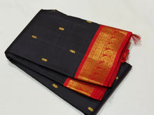 Vaibhogam- Mesmerizing Black with Red Buttas Handwoven Pure Jari Korvai Kanjivaram Silk with beautiful borders rich pallu and contrast woven blouse beauty