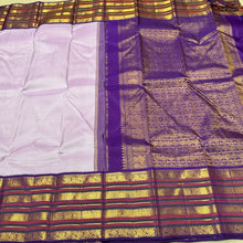 Vaibhogam- mesmerizing Lavendar with Deep Purple Korvai  Handwoven Pure 2gram Jari Kanjivaram Silk with Varisaipet borders woven beautiful body with Purple jamudu with super gorgeous pallu and contrast deep purple blouse. A very intricately woven borders