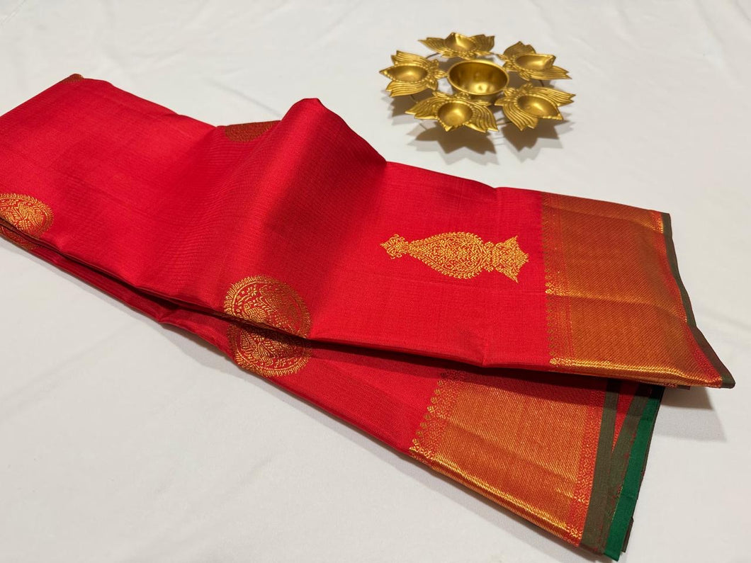 Red with Green Handwoven Pure Jari Kanjivaram Silk Saree with Buttas woven in muthukattam body with rich pallu and contrast Emerald Green Blouse beauty