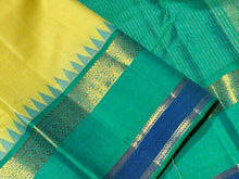 Sarasangi- Stunning Lemon Yellow with Aqua Green Blue Shade with Temple Spaced Borders Handwoven Pure Jari Korvai Kanjivaram Silk with rich seer pallu and contrast woven blouse. A super gorgeous piece for this wedding and festival season
