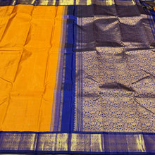 Vaibhogam- Stunning Mustard with MS Blue Buttas Handwoven Pure Jari Korvai Kanjivaram Silk with beautiful borders rich pallu and contrast woven blue blouse beauty