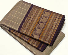 Saraswati- Gorgeous Abirami Beige with  Deep Purple Handwoven Premium Zariless Kanjivaram Silk with beautiful muthukattam silk checked body with gorgeous varisaipet borders rich sorgavaasal pallu and contrast woven blouse #thambooriexclusives #thambooricl