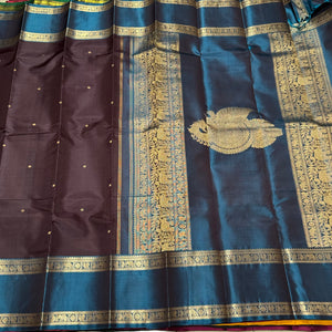 Deep Beetlenut Brown with Teal Blue Buttas with Doublepet Borders Handwoven Pure Jari Kanchipuram Silk Saree with Single Peacock Pallu Beauty