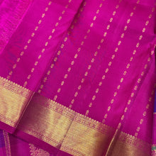 Multichecks with Buttas Rainbow Palum Pazhamum Checks with Mayil Chakram Buttas rich borders gorgeous Pink Pallu and Jari Striped Blouse Beauty