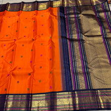 Vaibhogam -Strikingly Beautiful Orange with Deep kanchana Blue Kai Korvai Handwoven Pure Jari with Silk Buttas Pure Kanjivaram Silk with rich Meenakari Work Woven Borders gorgeous pallu and contrast woven blouse