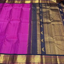 Vaibhogam- Stunning Magenta with dark kanchana blackish Blue Vairaoosi checks Handwoven Pure Jari Korvai Kanjivaram Silk with Rettaikili buttas woven body, beautiful borders rich pallu with bird buttas and contrast Vairaoosi woven blouse