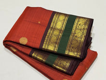 Gorgeous Burnt Orange with Brown Buttas Handwoven Pure Jari Kanjivaram Silk with Rettapet Borders Rich Pallu and Contrast woven beautiful blouse