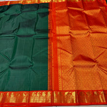 Sarasangi-Beautiful Bottle Green with Orange Handwoven Pure Korvai Kanjivaram Silk with beautiful paisleys and rudrakshas woven borders rich pallu and contrast woven blouse