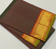 Nayaki- Mesmerizing Manthulir Green with Orange Handwoven Pure Kanjivaram Silk with beautiful bawanchi borders with rich pallu and contrast woven blouse