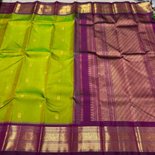 Vaibhogam -Mesmerizing Sneha Green with Deep Purple Handwoven Pure Jari Korvai Kanjivaram Silk with Mayil Chakram Buttas Woven Body with Gorgeous Temples woven intricate borders rich pallu and contrast woven blouse