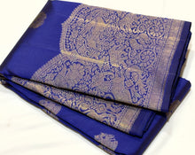 Vaibhogam- Stunning Royal Blue with Gold Handwoven Pure 2g Jari Kanjivaram Silk with beautiful peacocks and iruthalaipakshi motits woven body with beautiful turning borders with gorgeous weaving rich pallu and buttas woven blouse