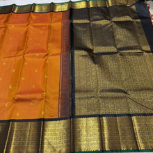 Vaibhogam- Stunning Rust with Black Handwoven Pure 2g Jari Korvai Kanjivaram Silk with mayil kuyil bird buttas with rich borders gorgeous pallu and contrast woven blouse