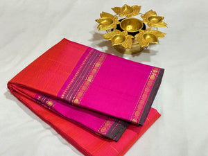 Double tone Orange with Pink with Mallimoggu Buttas and Doublepet Borders in a Handwoven Pure Kanjivaram Silk Saree Beauty